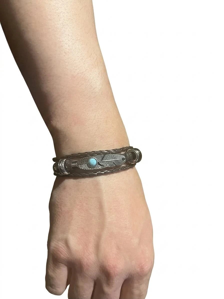 Bracelet plume avec perle bleu